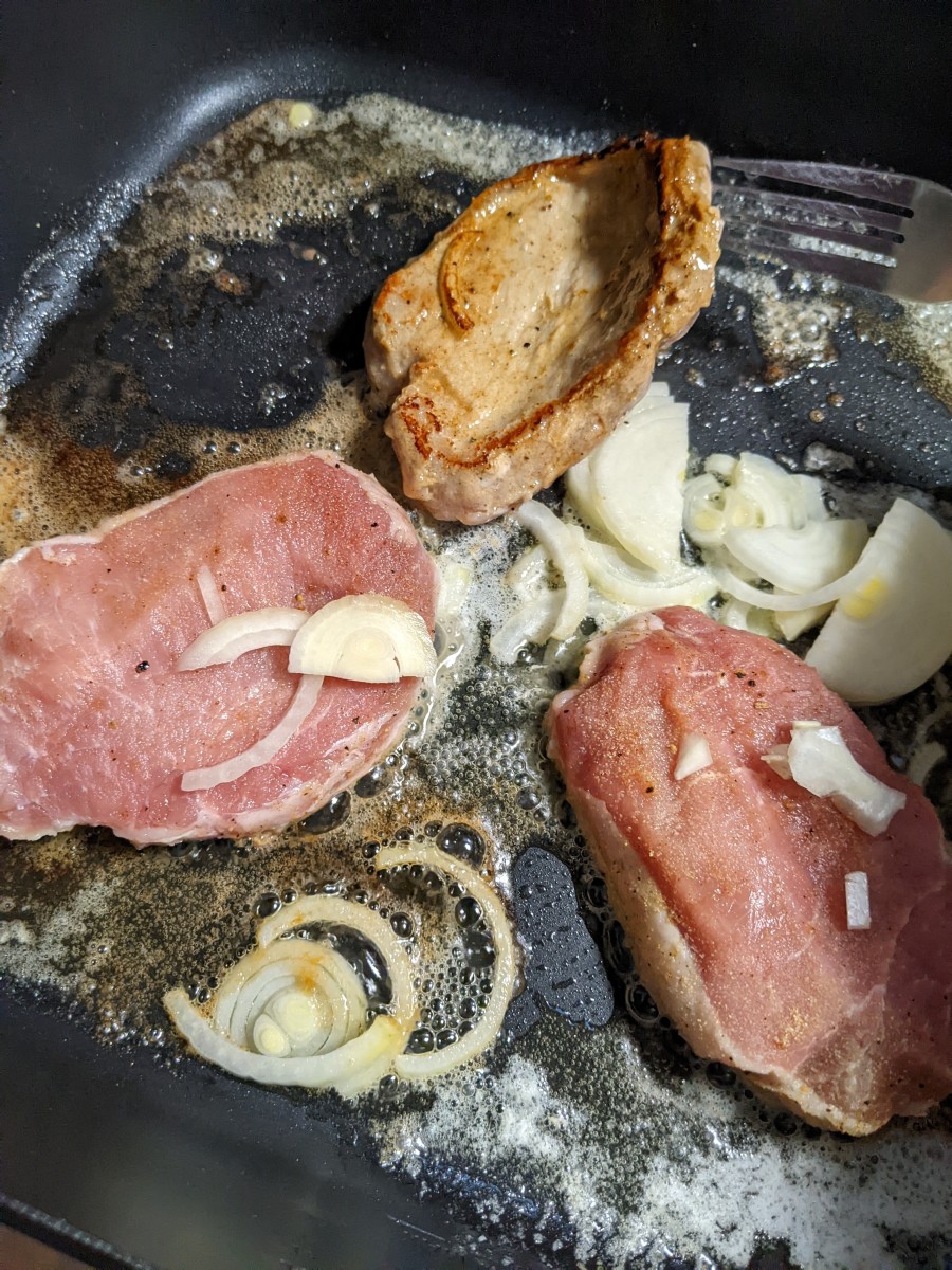 pork-chops-fried-in-butter-with-onion-slices
