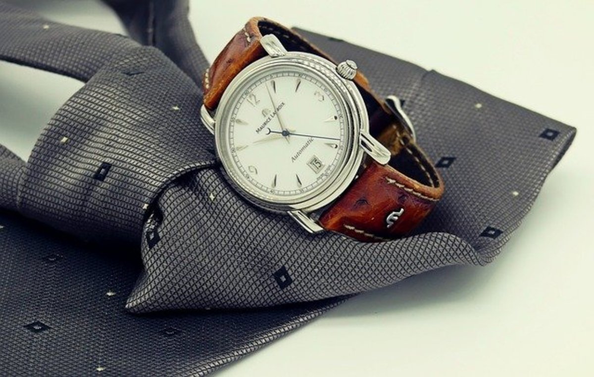 man's watch and tie