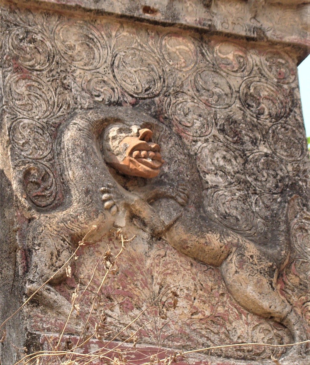 Lion with a single face and two bodies on temple wall; stucco; Shiva temple; Dubrajpur, Birbhum