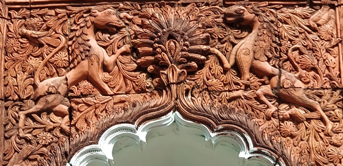 Lions on the arch panel; terracotta; Narayan temple; Dey Para; Jaipur, Bankura