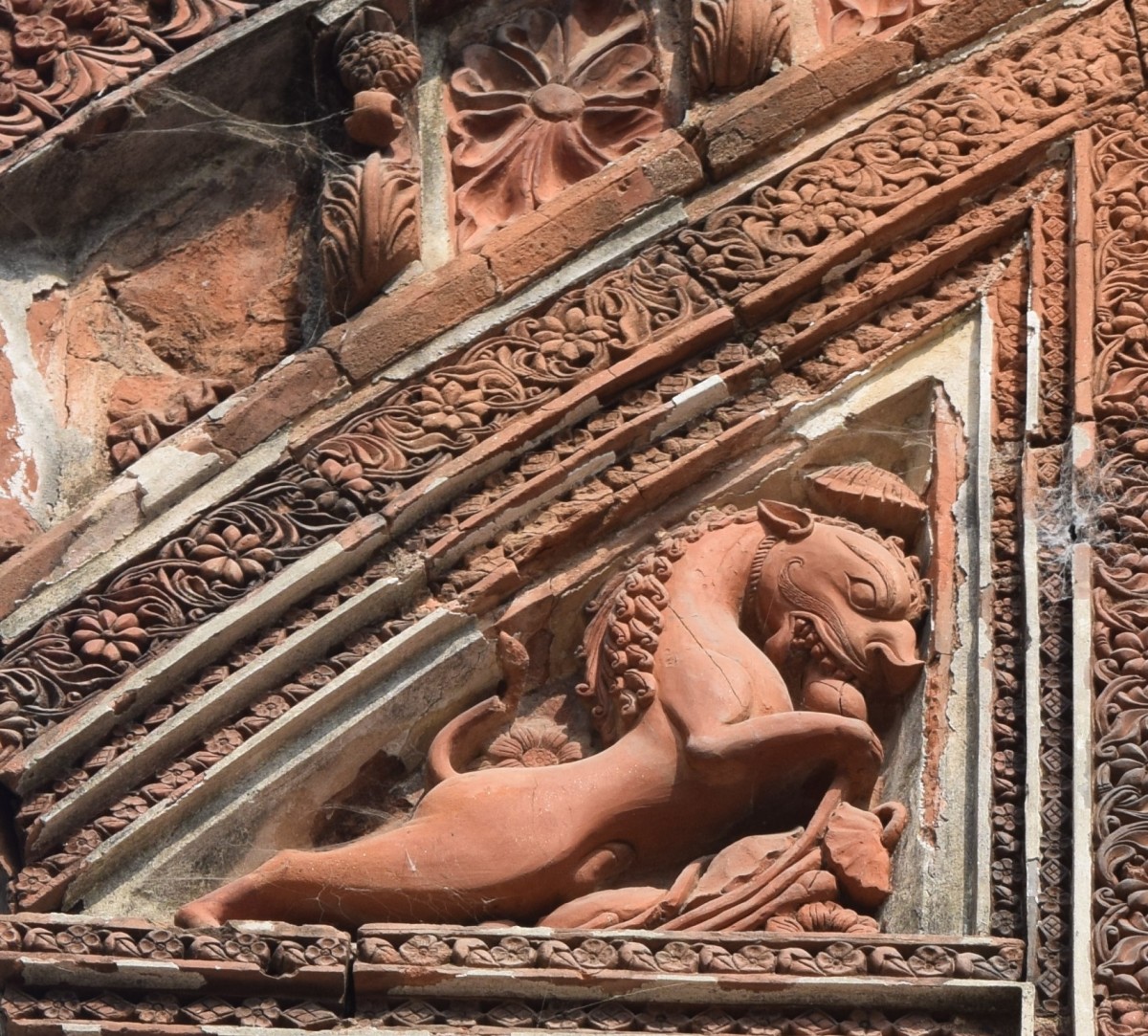 Lion on angle panel; terracotta;  Shiva temple; Sribati; Purva Bardhaman