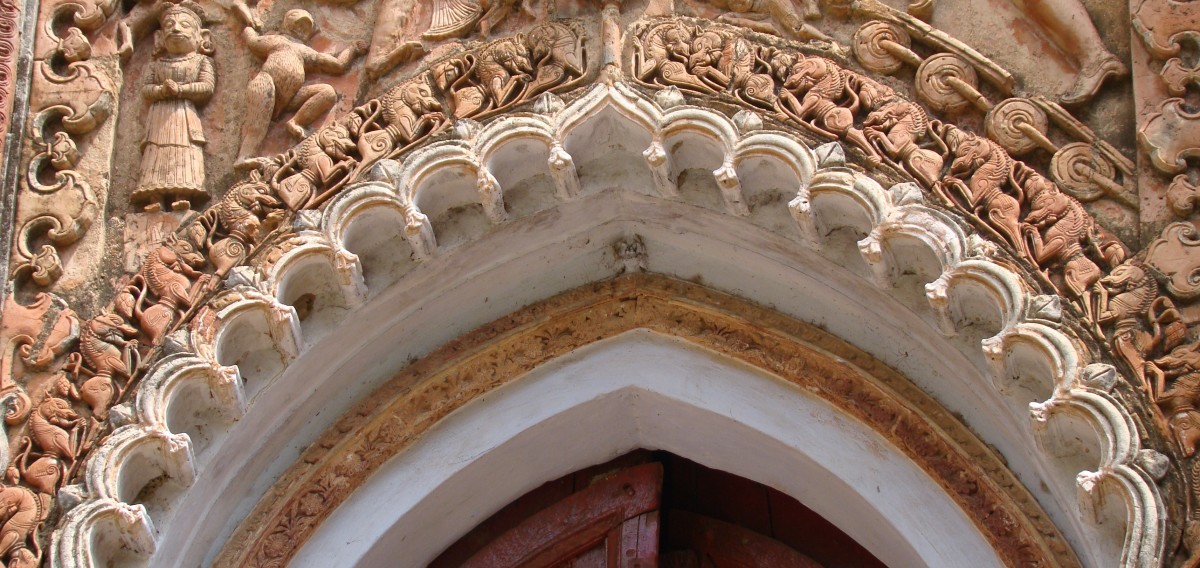 Lions on the arch panel; terracotta; Charbangla temple; Baranagar, Murshidabad