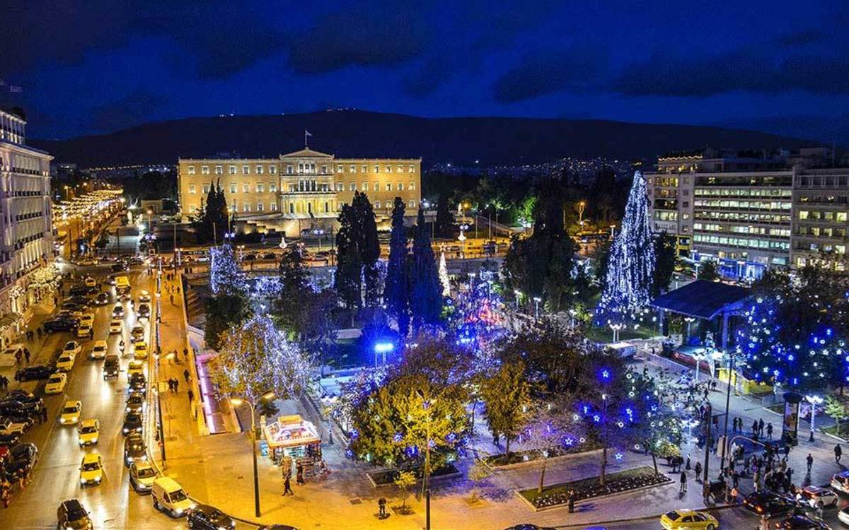 Syntagma Square at night showcasing the Parliament.