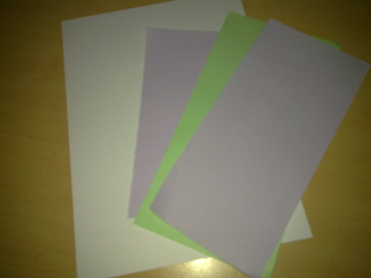 A white card and color papers