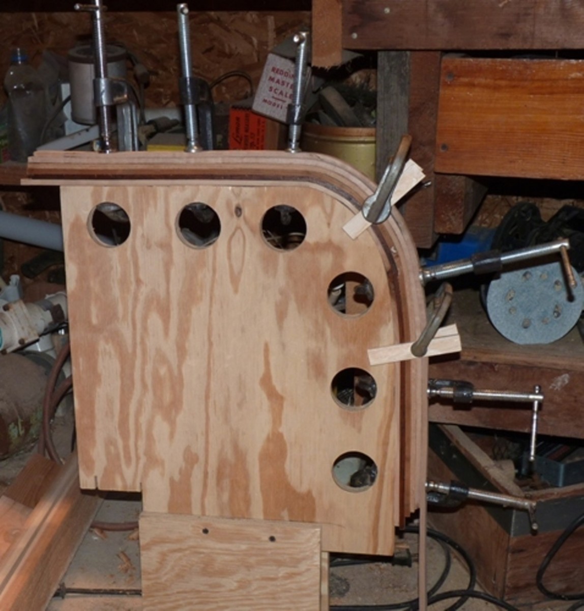 Stem strips glued and clamped to stern form