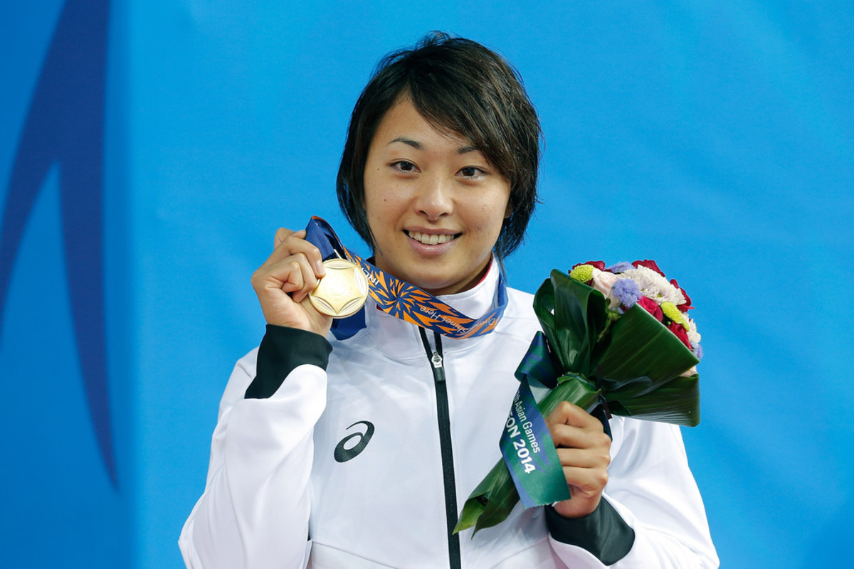 Satomi Suzuki celebrates as she got the gold medal during the 2014 Asian Games.