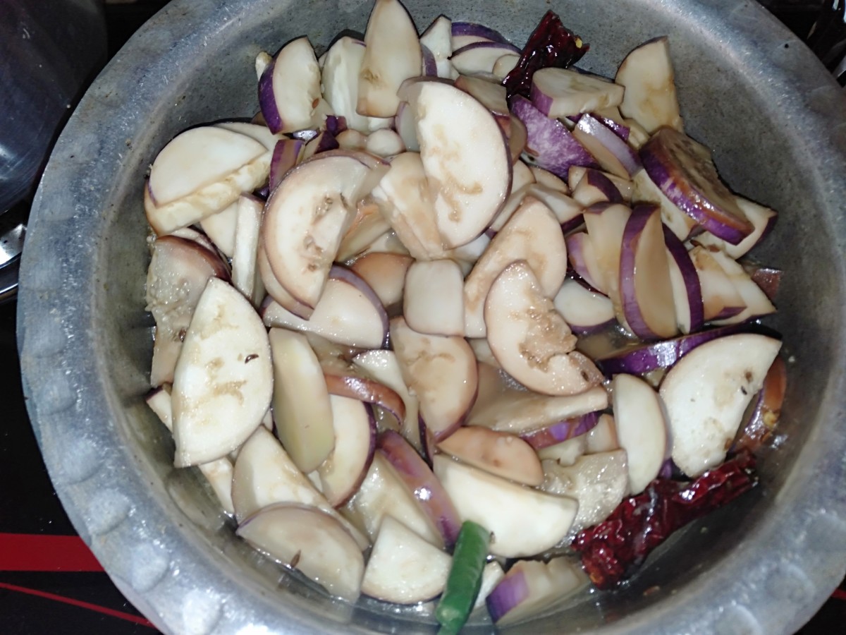 Add roughly chopped eggplant and salt. Mix well.