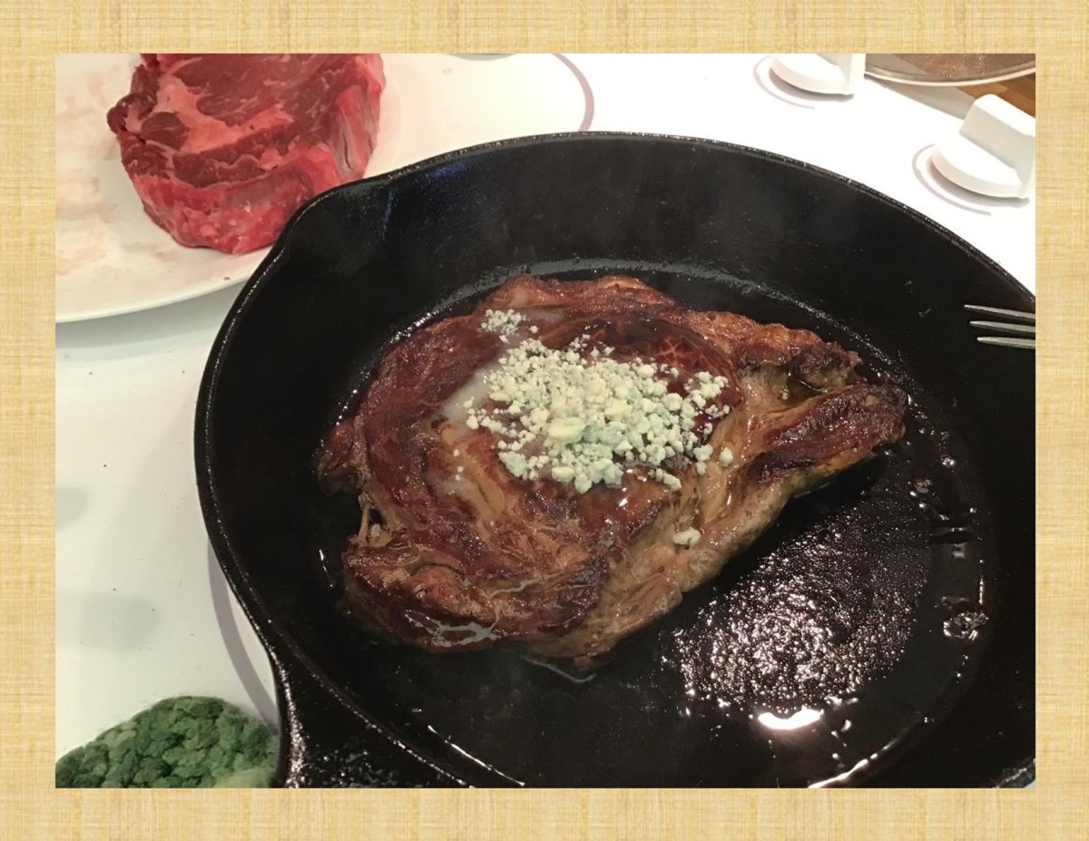 Butter ( used a table teaspoon full) on steak first then Blue Cheese. Let melt a bit then....