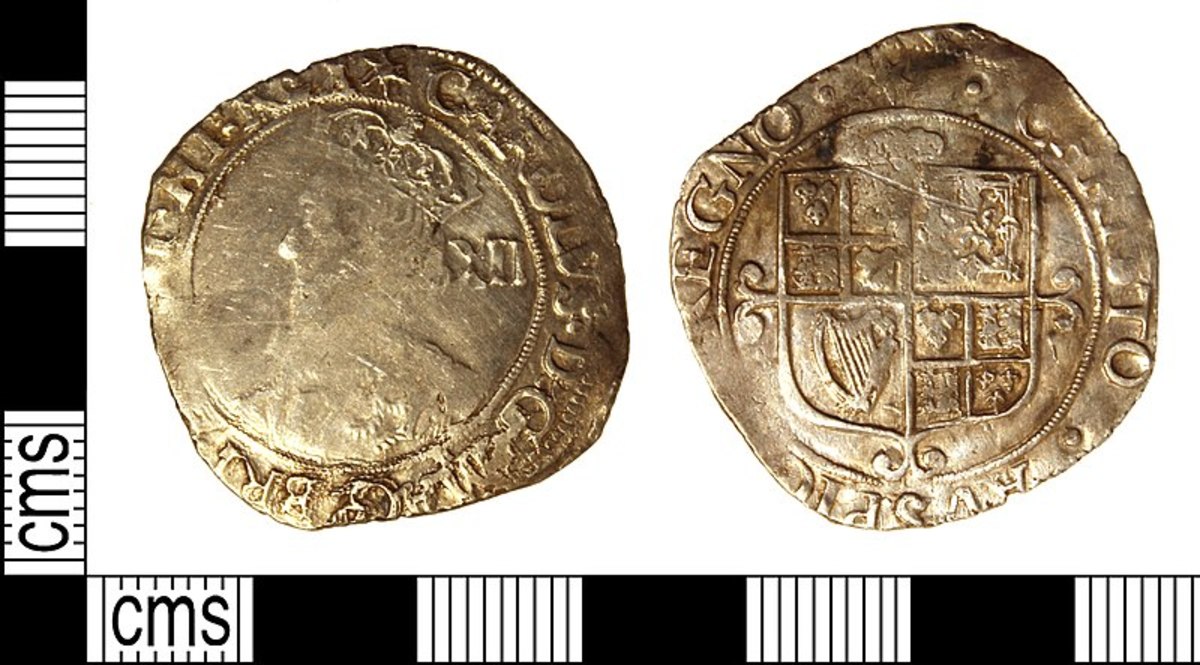 Charles I shilling whose edges have been nibbled away by clippers.