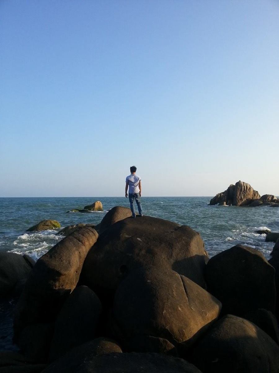 Facing the sea at Rocky Cliff in Phan Thiet, Binh Thuan