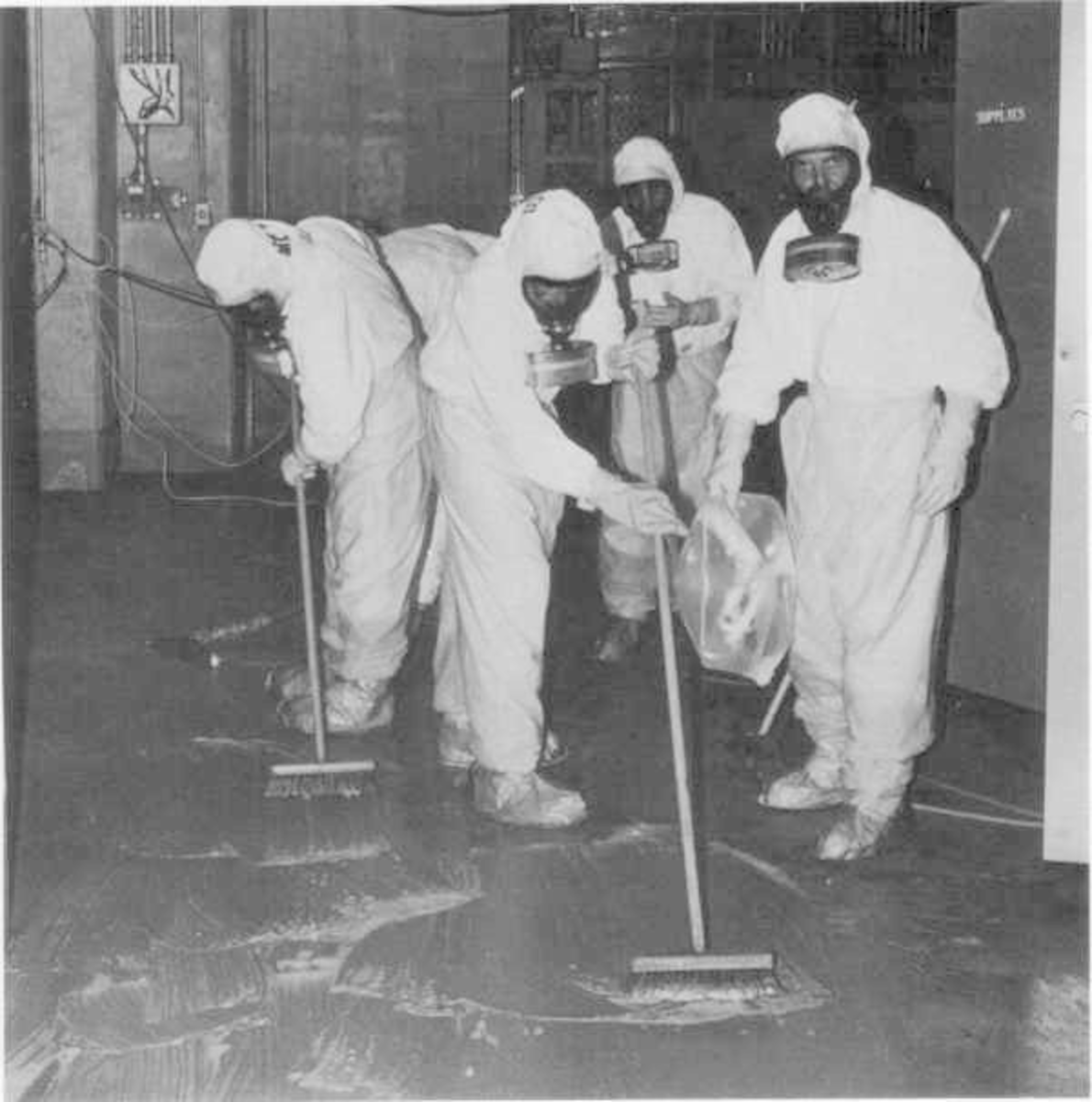 Three Mile Island TMI personnel cleaning up the contaminated auxiliary building in October of 1979.