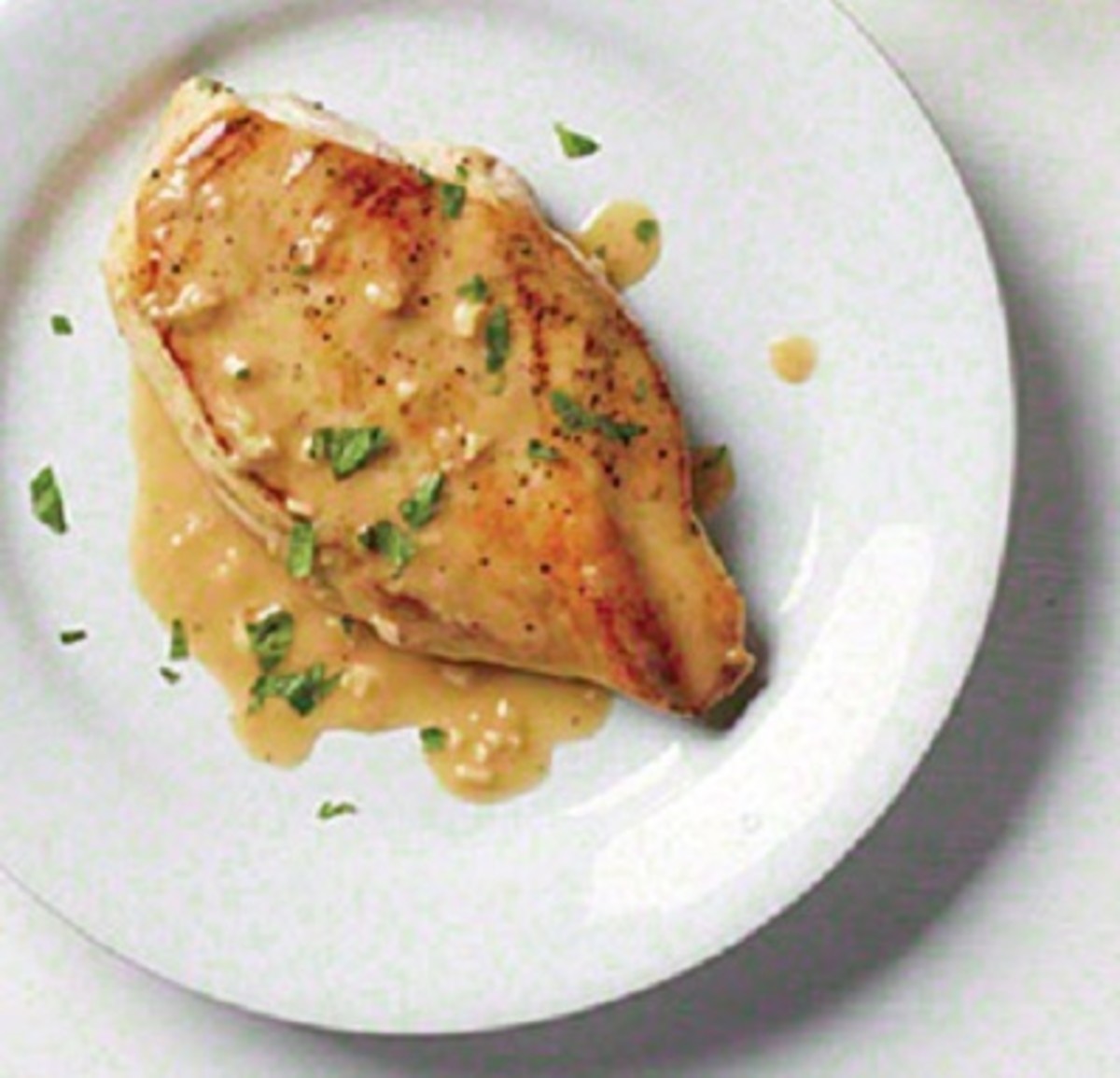 Pan-seared chicken breast with butter-rich pan sauce