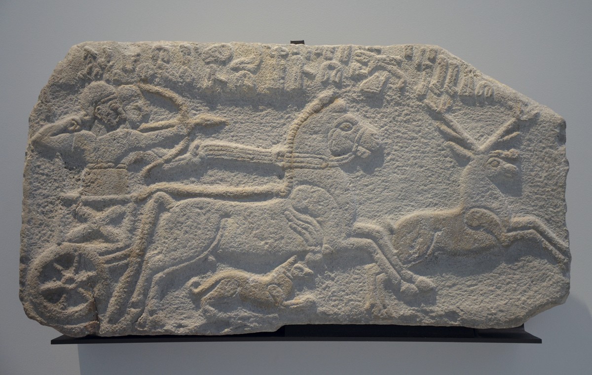 A relief depicting a Neo-Hittite king conducting a stag hunt via chariot.
