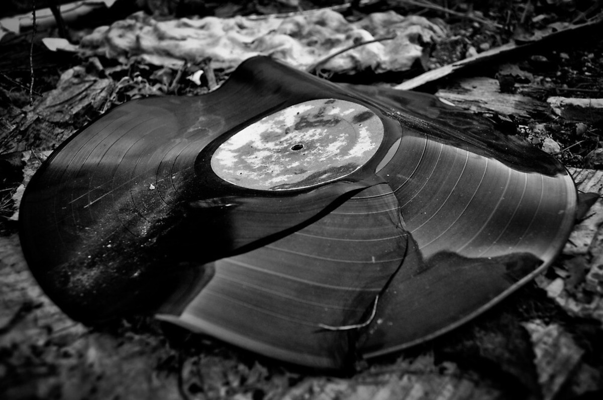 Scratched Up Broken Record