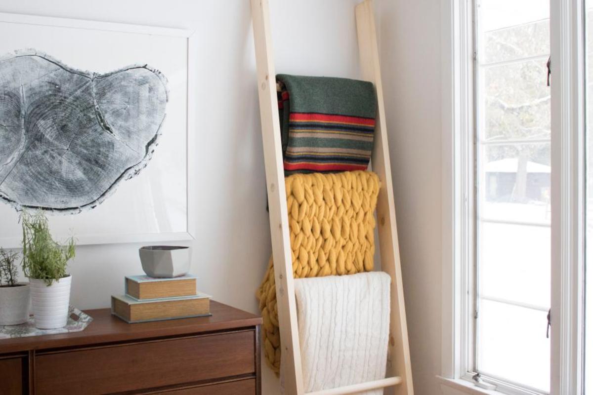 At this blanket-loving household, we use a blanket ladder almost every day. Even in the summer, my kids are still carrying one. The blanket ladder is a convenient way to hang blankets and, in my opinion, it also looks cool. 
