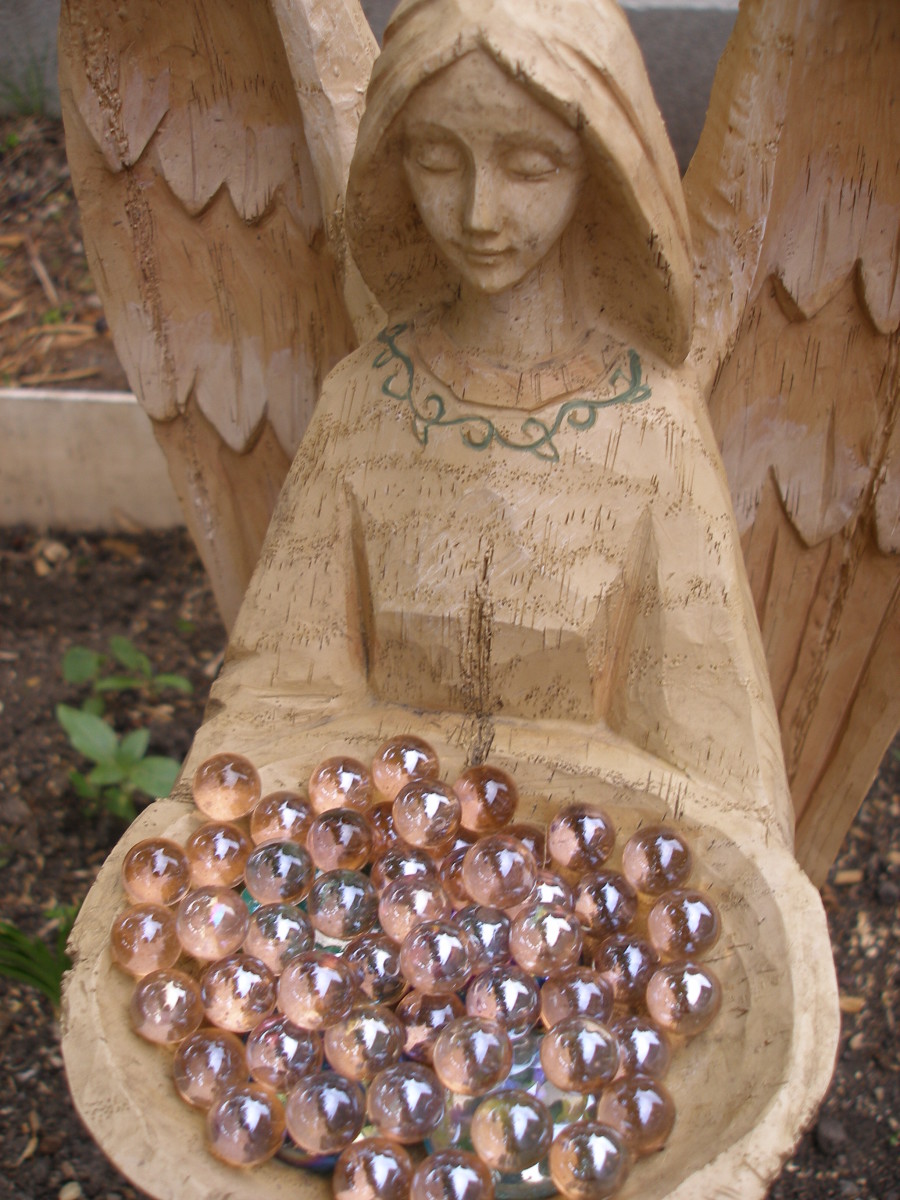 Garden Décor-A wooden Angel with marbles 