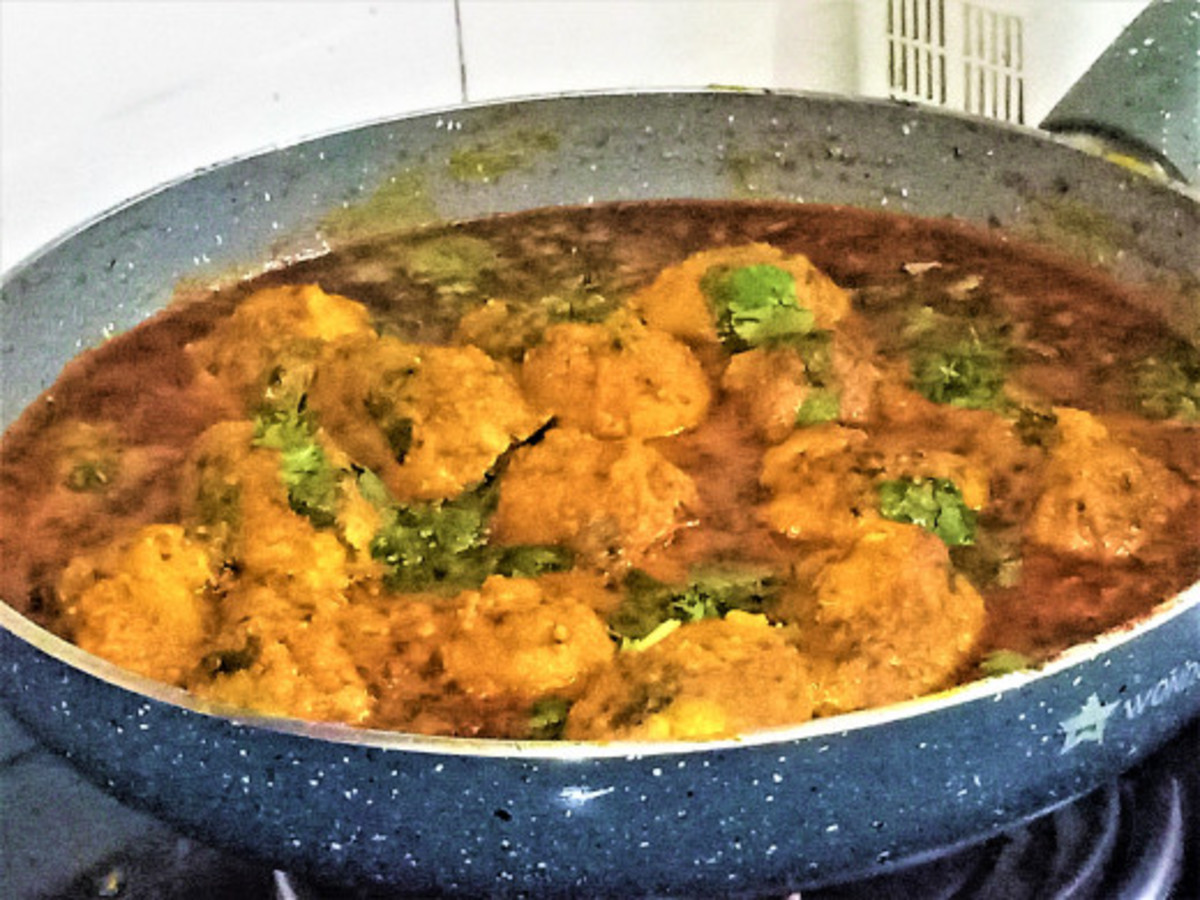 Dum arbi (taro root curry) prepared in the dhaba style