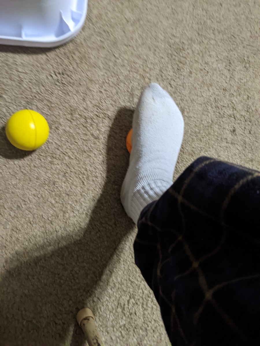 Press ball with foot. Toe only. Heel only. Roll ball with foot. 