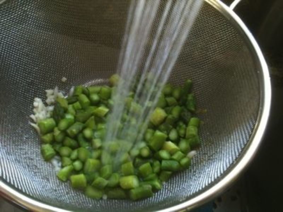Rinse asparagus in cold water to complete the blanching.