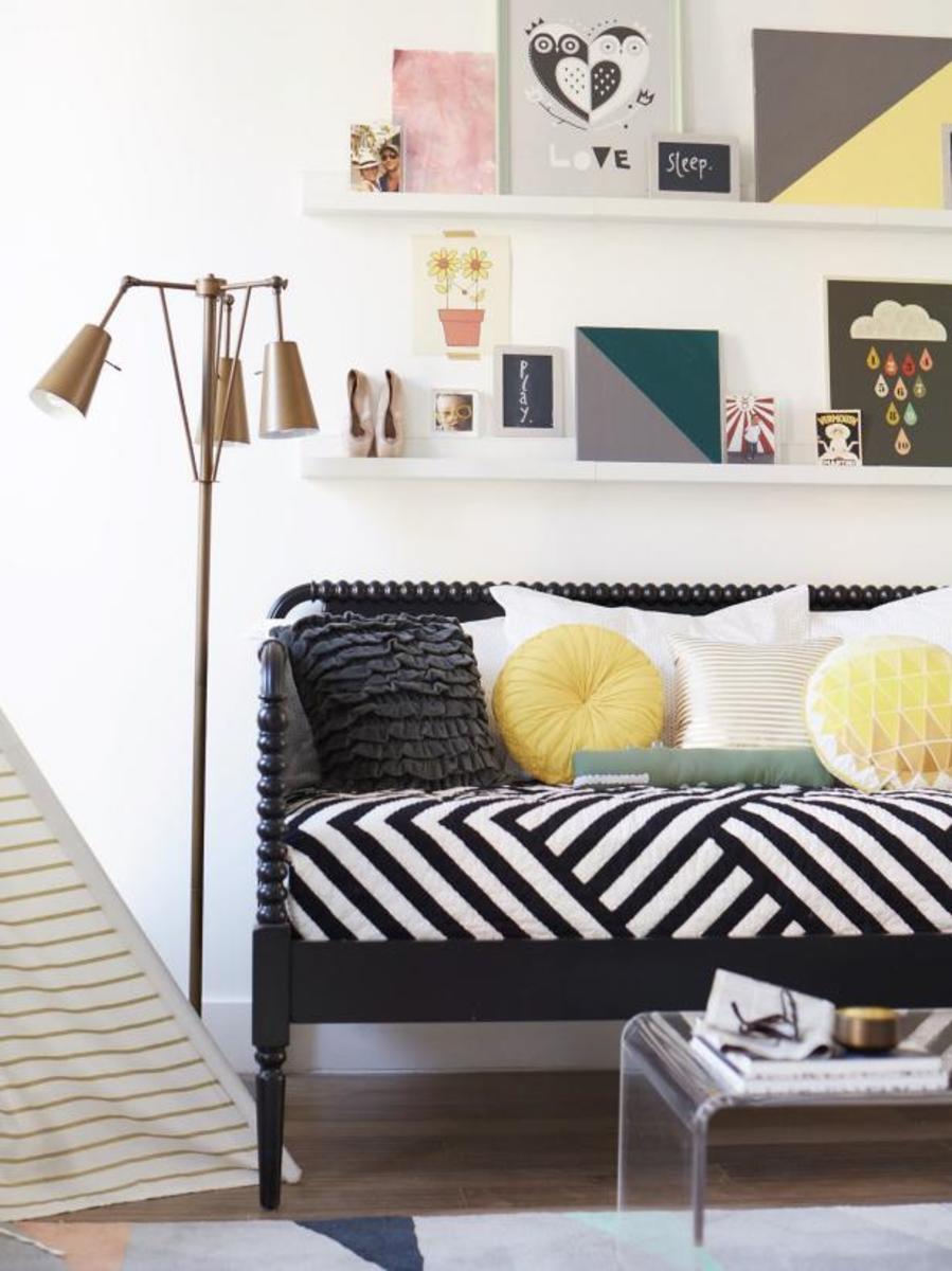 Overwhelm a room with too many colors and patterns.