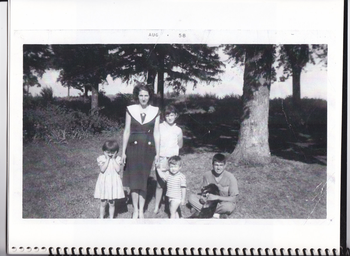 Bea standing next to mom in 1958