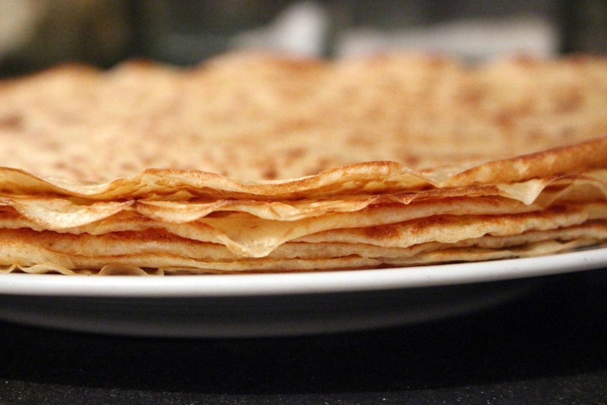Paper-thin golden crepes waiting to be filled