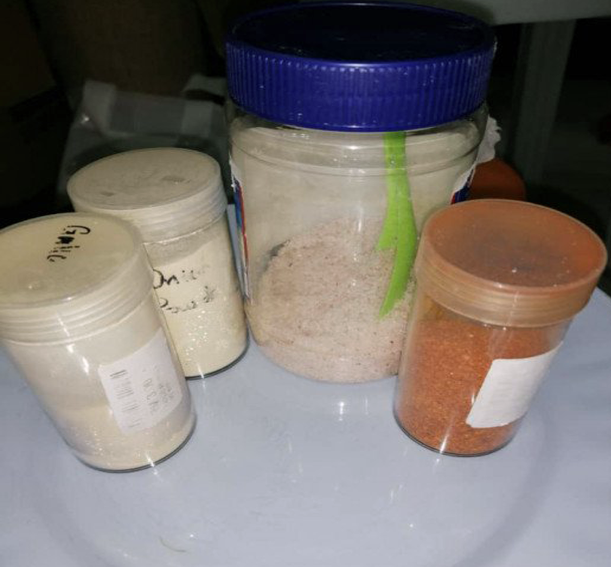 (L -R) Garlic powder, Onion powder, Himalayan Pink Salt, and Chili powder