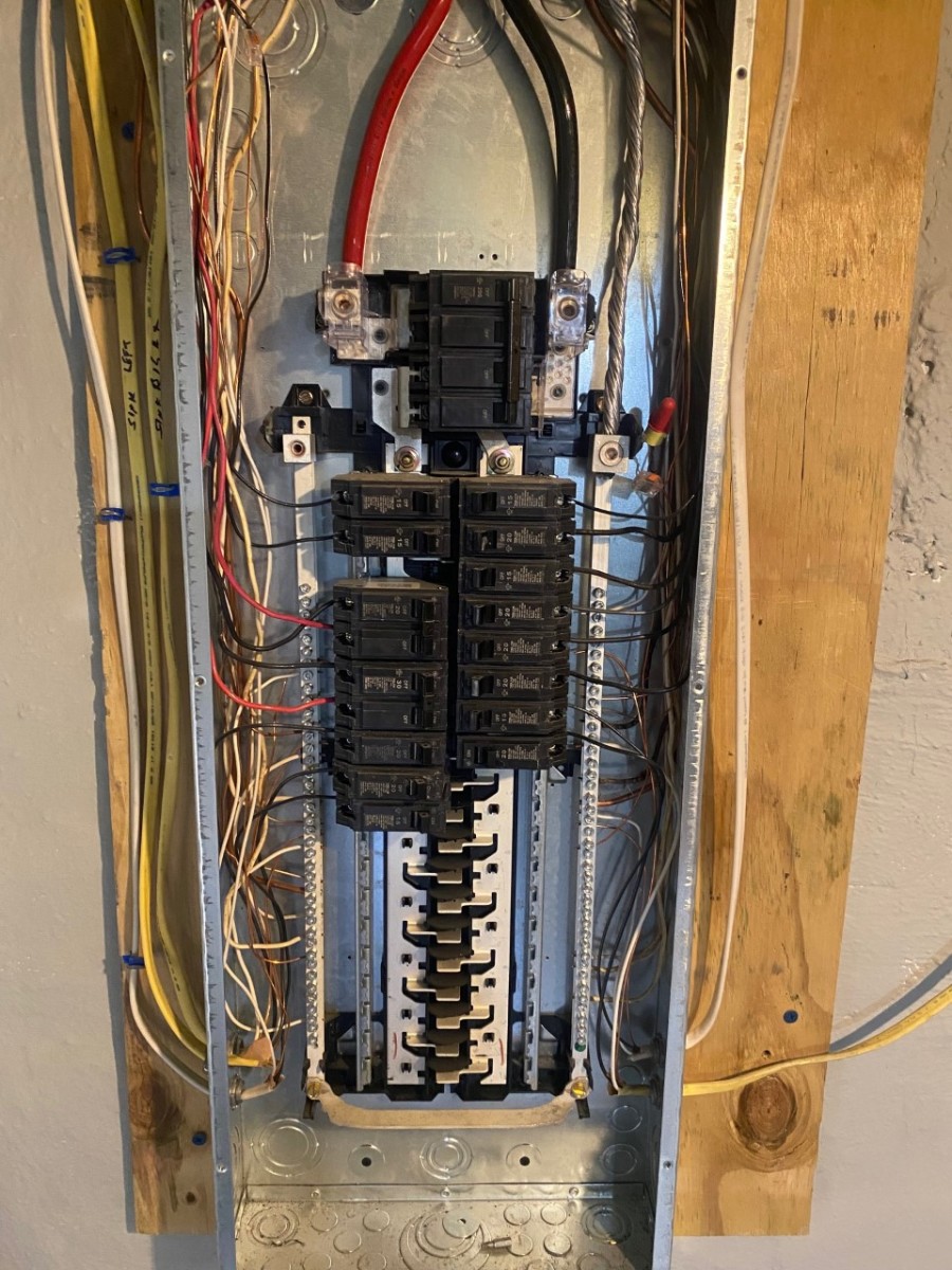 An electrical panel with the cover off
