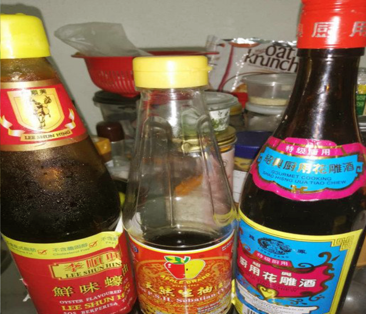 (L - R) Oyster sauce, light soy sauce, and Shao Xing wine 