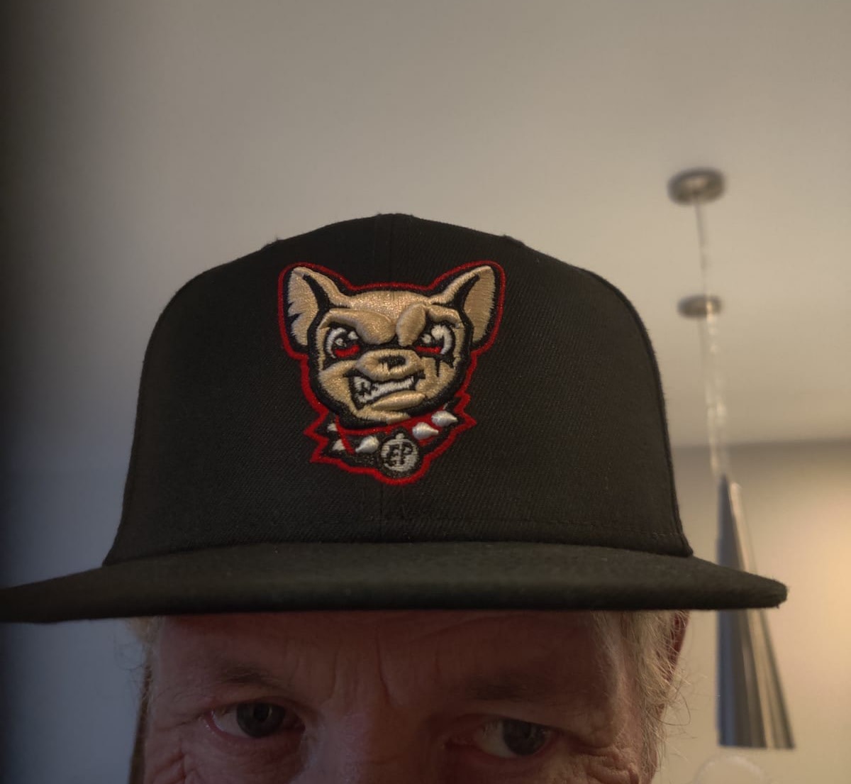 Your revered reviewer walks around wearing an El Paso Chihuahuas ballcap, giving a metaphorical middle finger to all of those high-falutin' "real" Texans.
