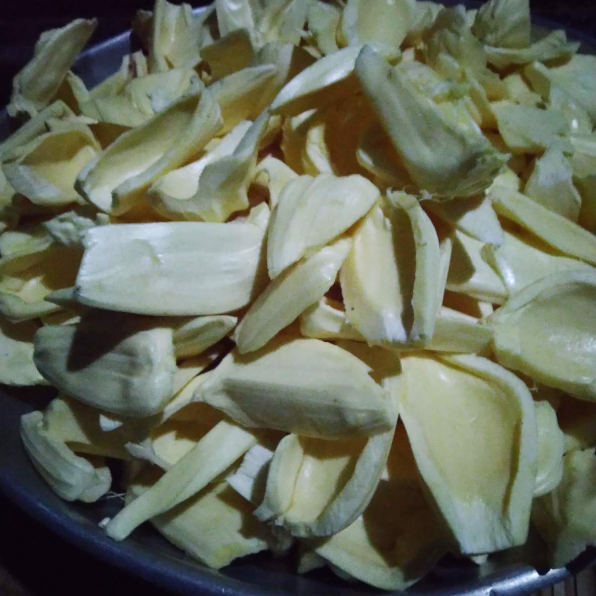 Jackfruit perianth lobes cut, seperated cleaned and split by removing seeds