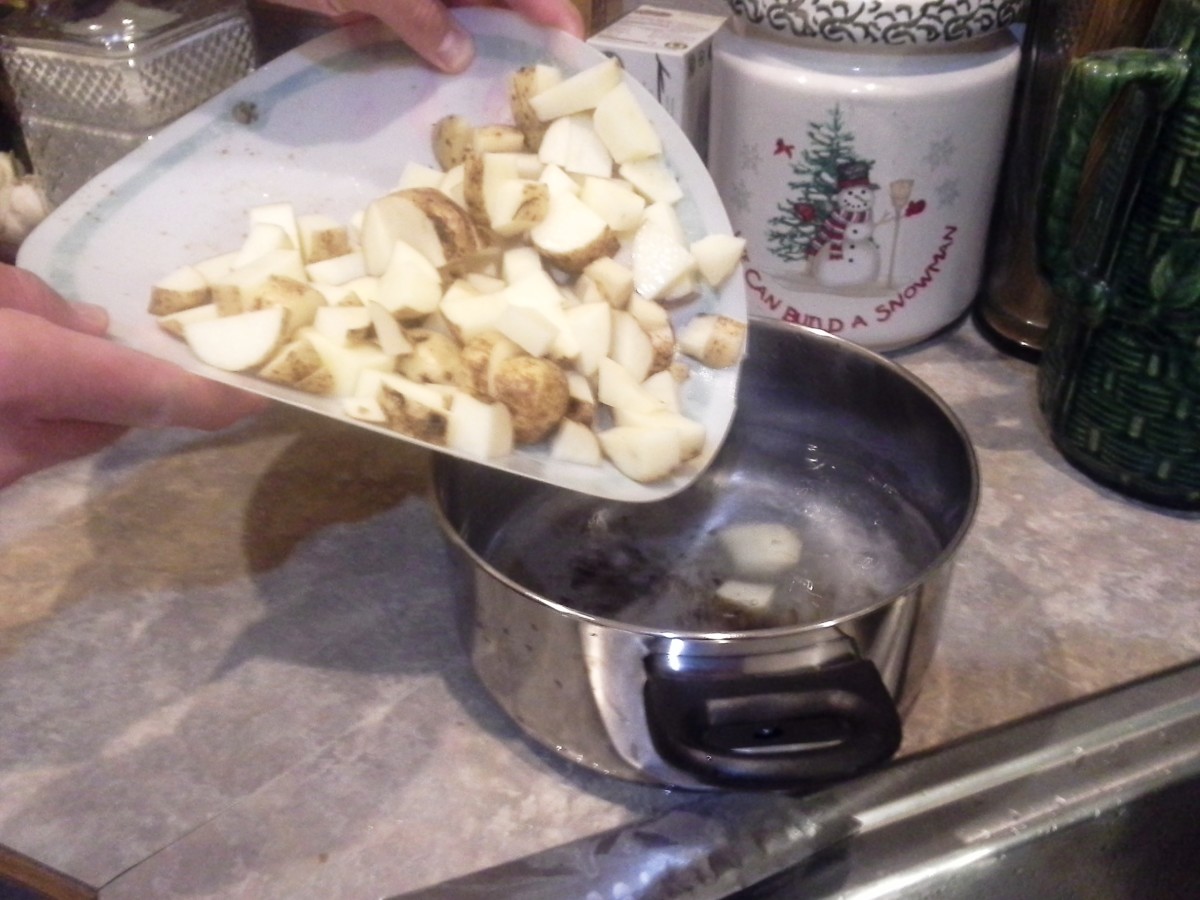 Step Four: Pour your chopped potatoes into a small soup pot filled at least halfway with water