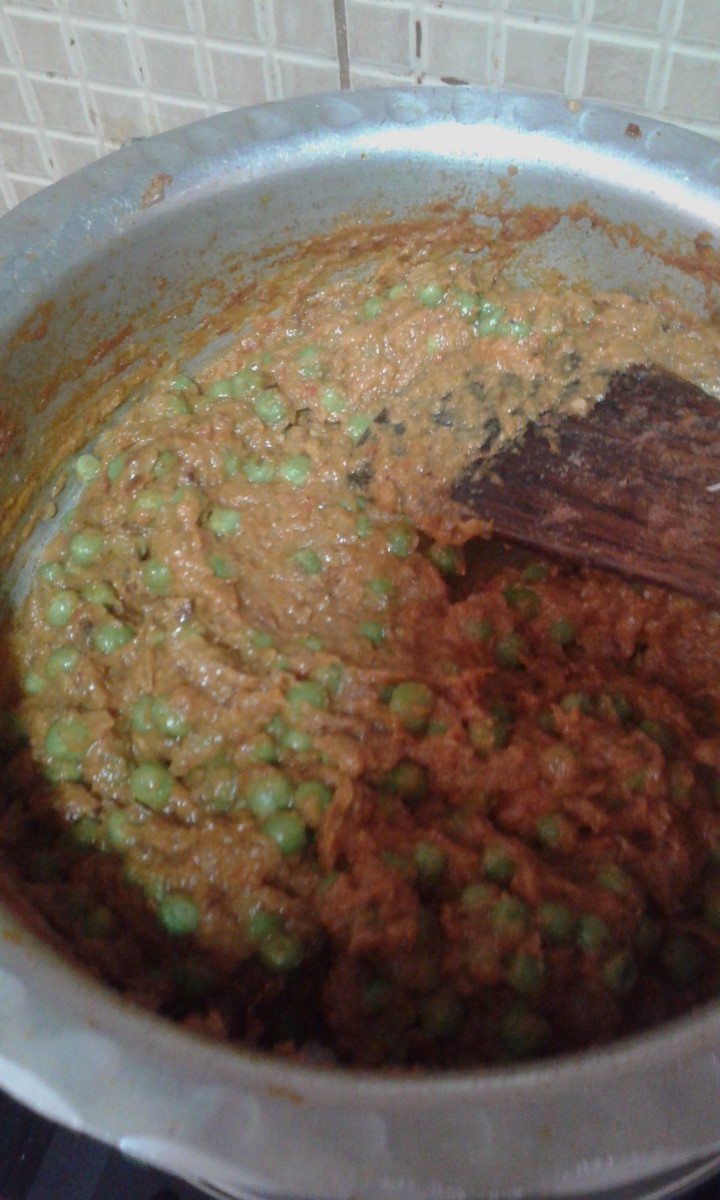 Add green peas and mix well. Cook until green peas are done.