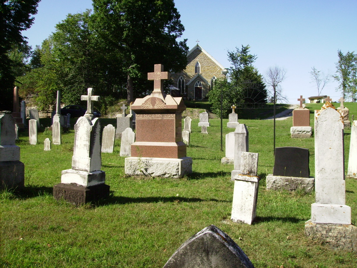 Holy Japanese Martyr's Cemetery and 1860 Phillipsville Parish Church (now a private home) in PHillipsville, Ontario, Canada.