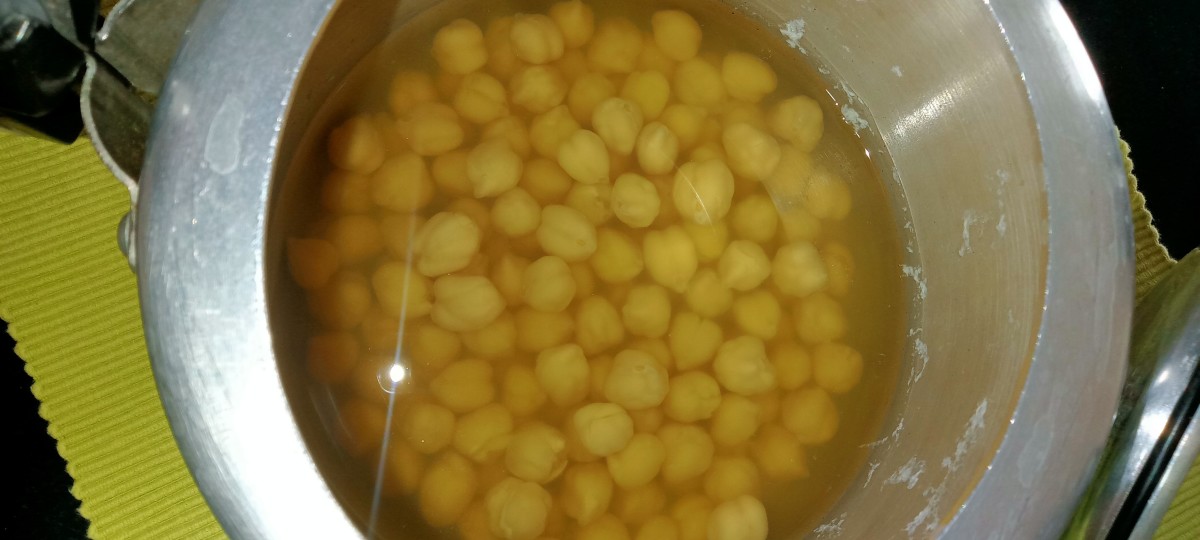 Boil soaked chickpeas with some salt.