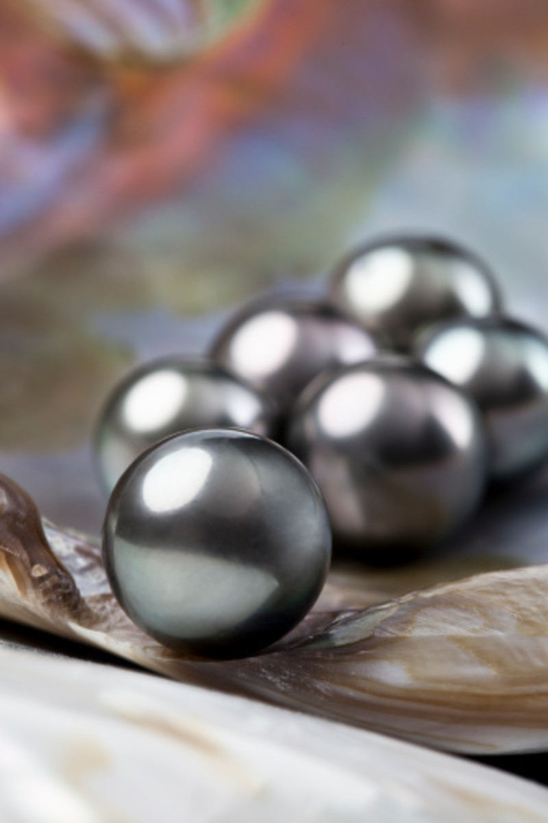 A gift of black pearls foreshadows love on the horizon.