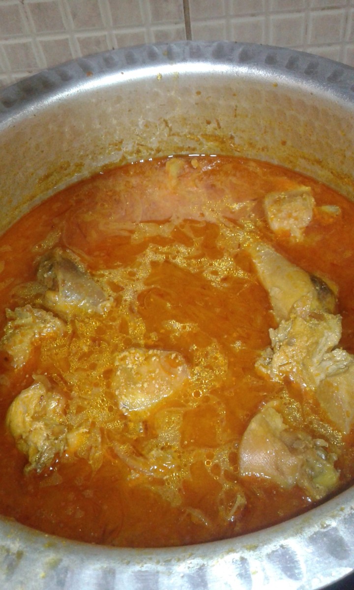Add some water to cook the chicken. Once the chicken is cooked, add fried onion, and mix well. 