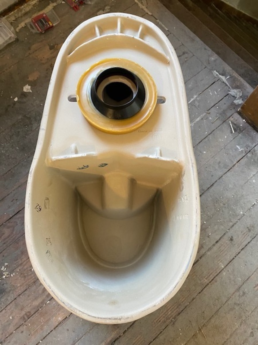 Toilet upside down with wax ring installed