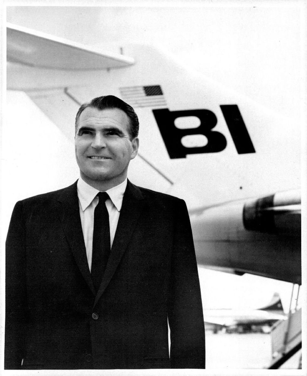 1965. He is seen with one of the new Boeing 727s he introduced into the Braniff fleet that would become the workhorse of the flamboyant Texas carrier.
