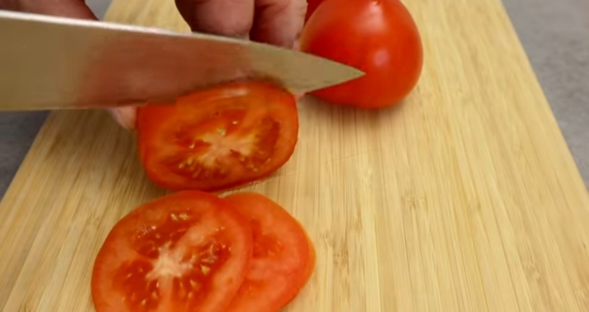 Slice the tomatoes.