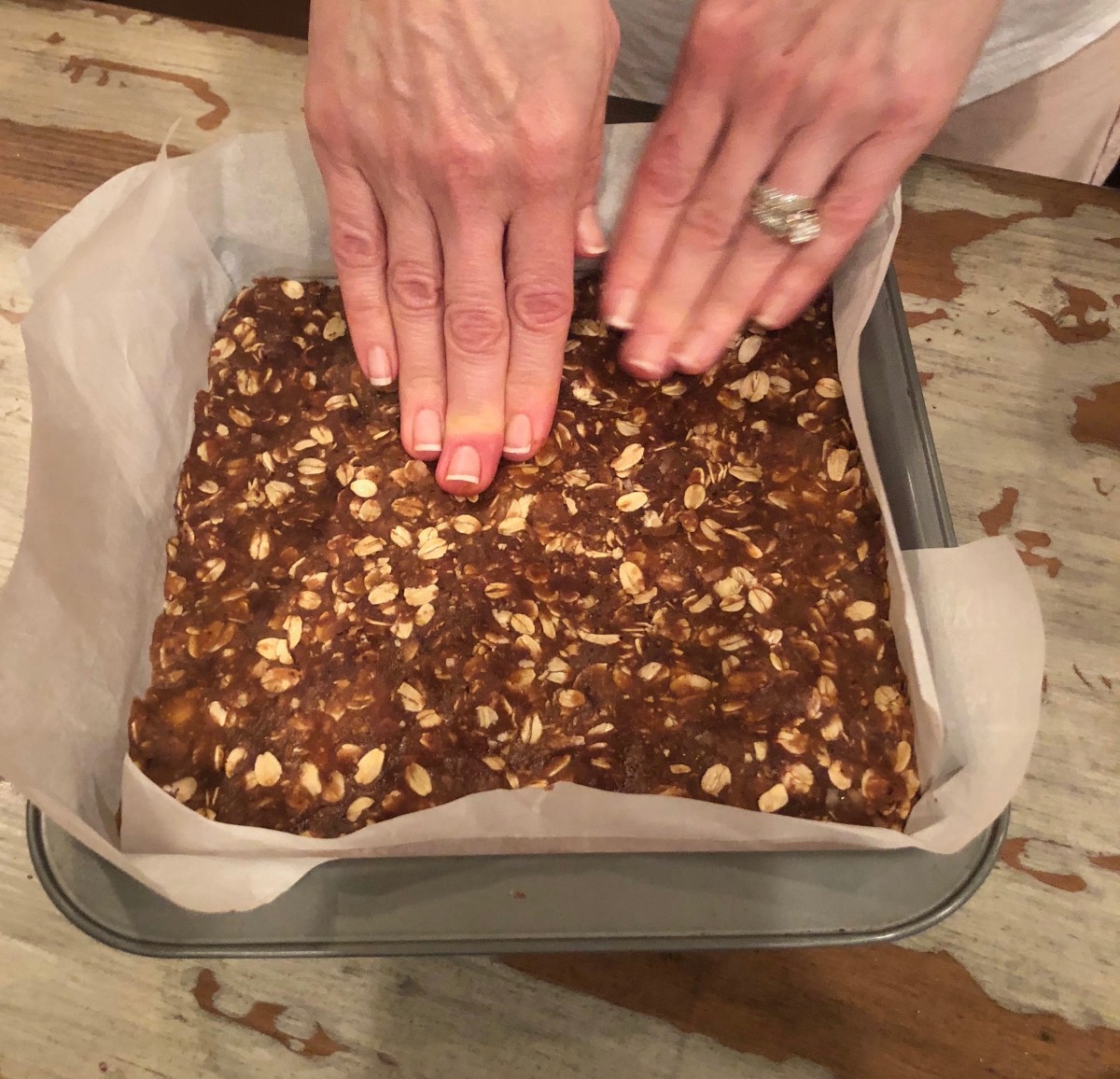 My daughter making these protein bars.