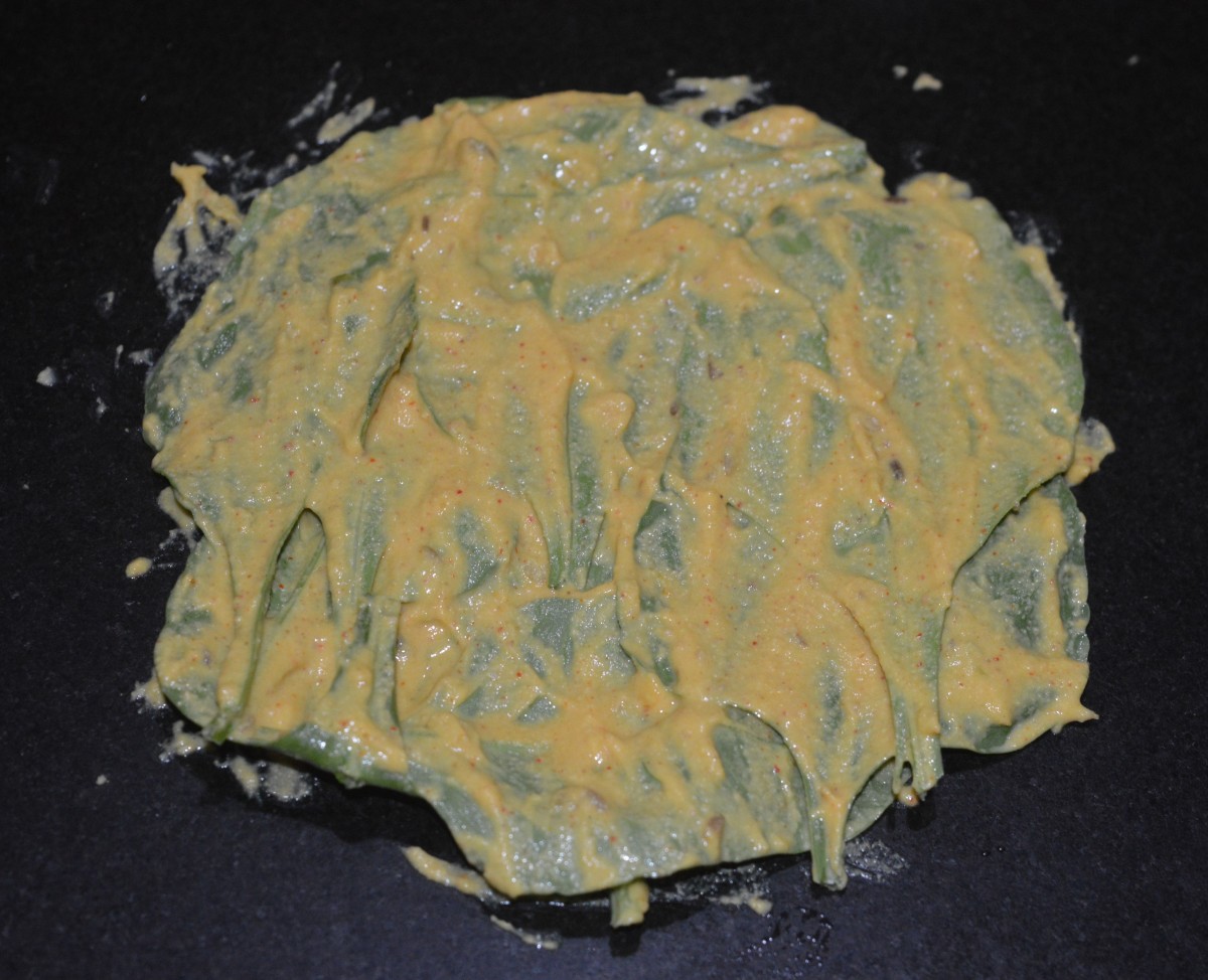 Step six: Prepare spinach rolls by placing spinach leaves and applying the batter as per instructions.