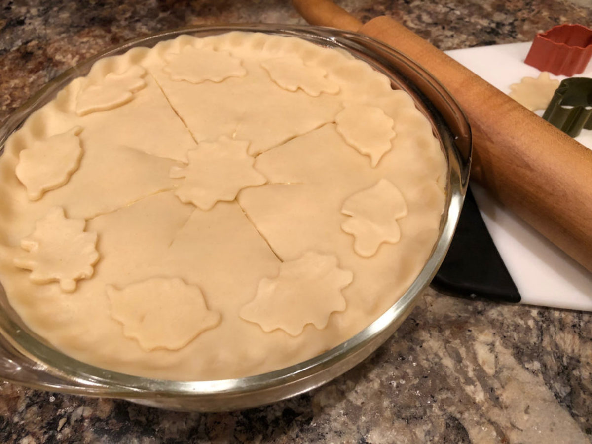 Here's the pie, ready to go into the oven. Soon, it will be served with a salad for a delicious meal.