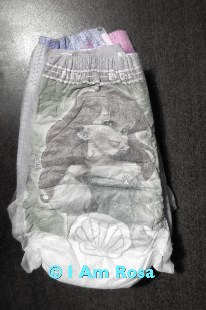 Colour for Huggies was removed so you can better see the Pampers diaper under it.