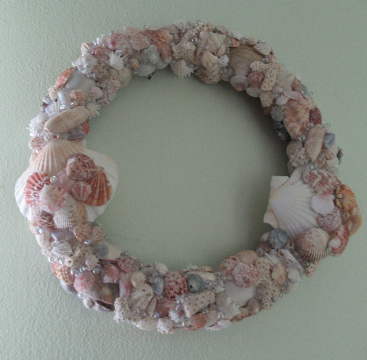 Displaying your shell collections on wreaths is a way to keep those beach memories alive.