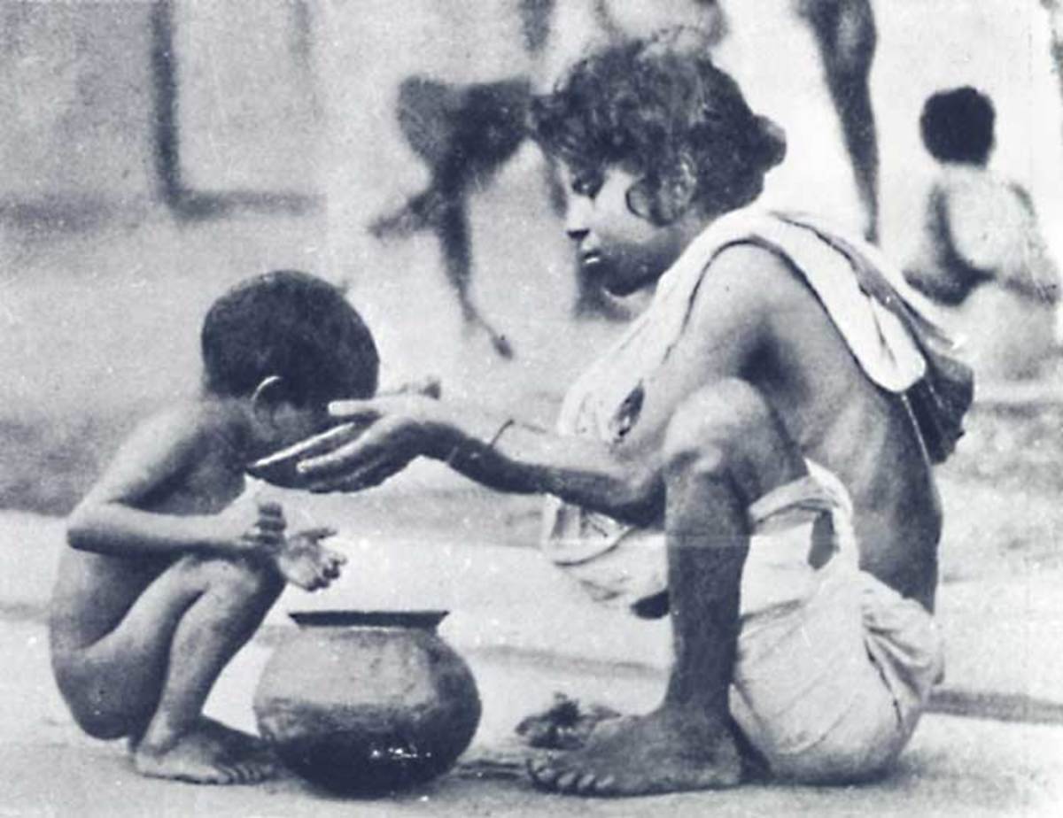 A child helping a child during the famine.