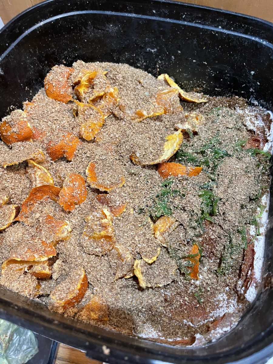 The food scraps again, after being covered in bokashi bran. This bucket is almost full and will be moving on to step 6 soon!