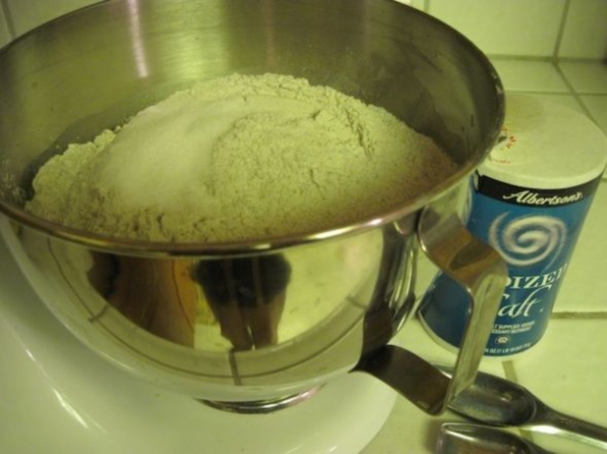 Add rye flour and salt to wet ingredients.