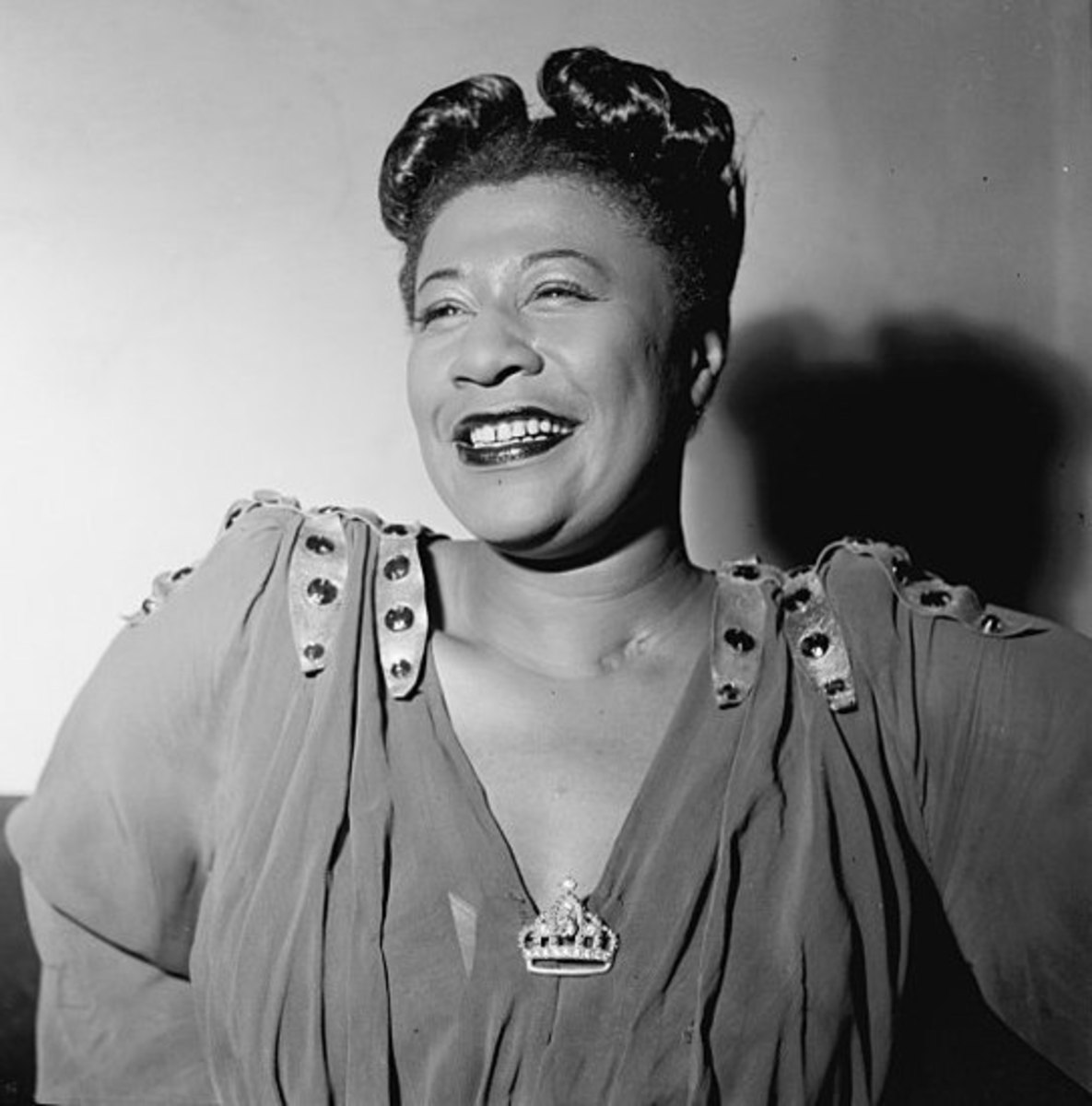 Ella Fitzgerald, whose ageless voice sold 40 million albums and won 13 Grammys. Her pitch was so perfect her band would tune to it. Born with the Sun in Taurus and Uranus precisely on her chart's Descendant.