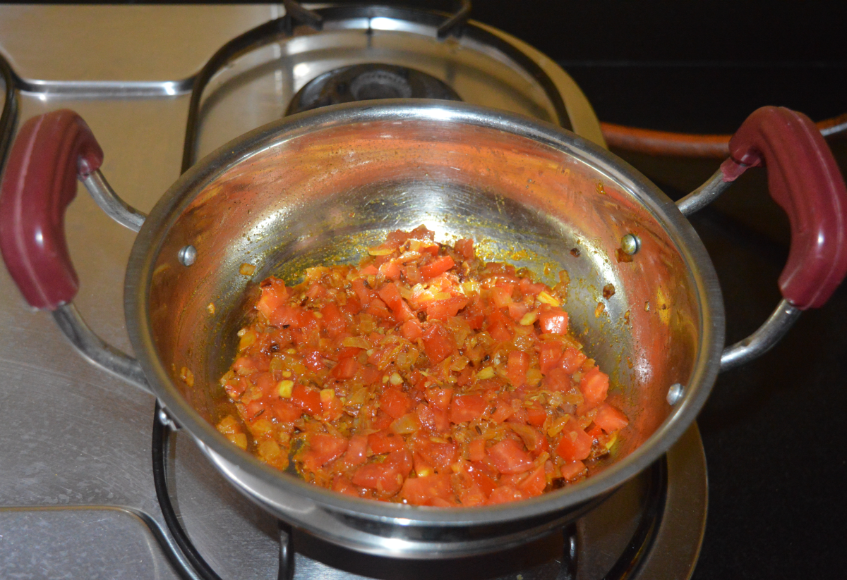 Continue to saute until the tomatoes become mushy.